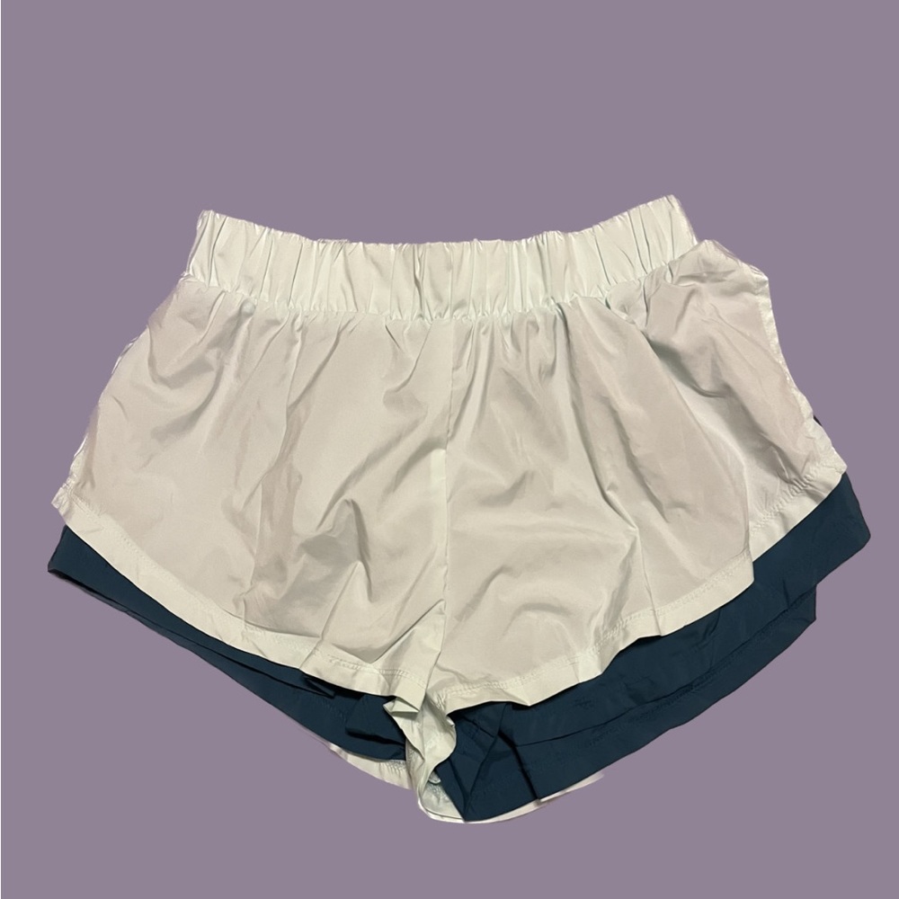 Free people movement blue shorts